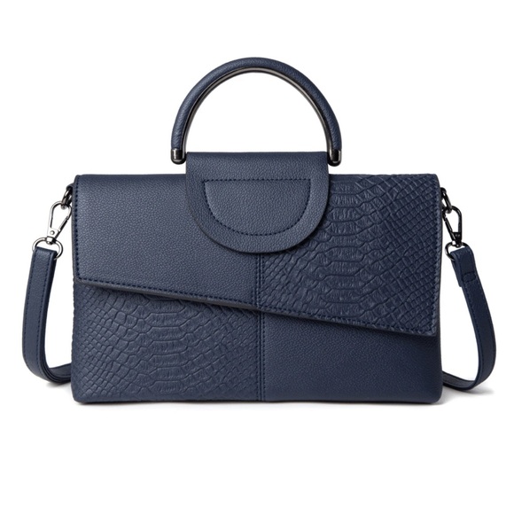 Luce vegan leather clutch